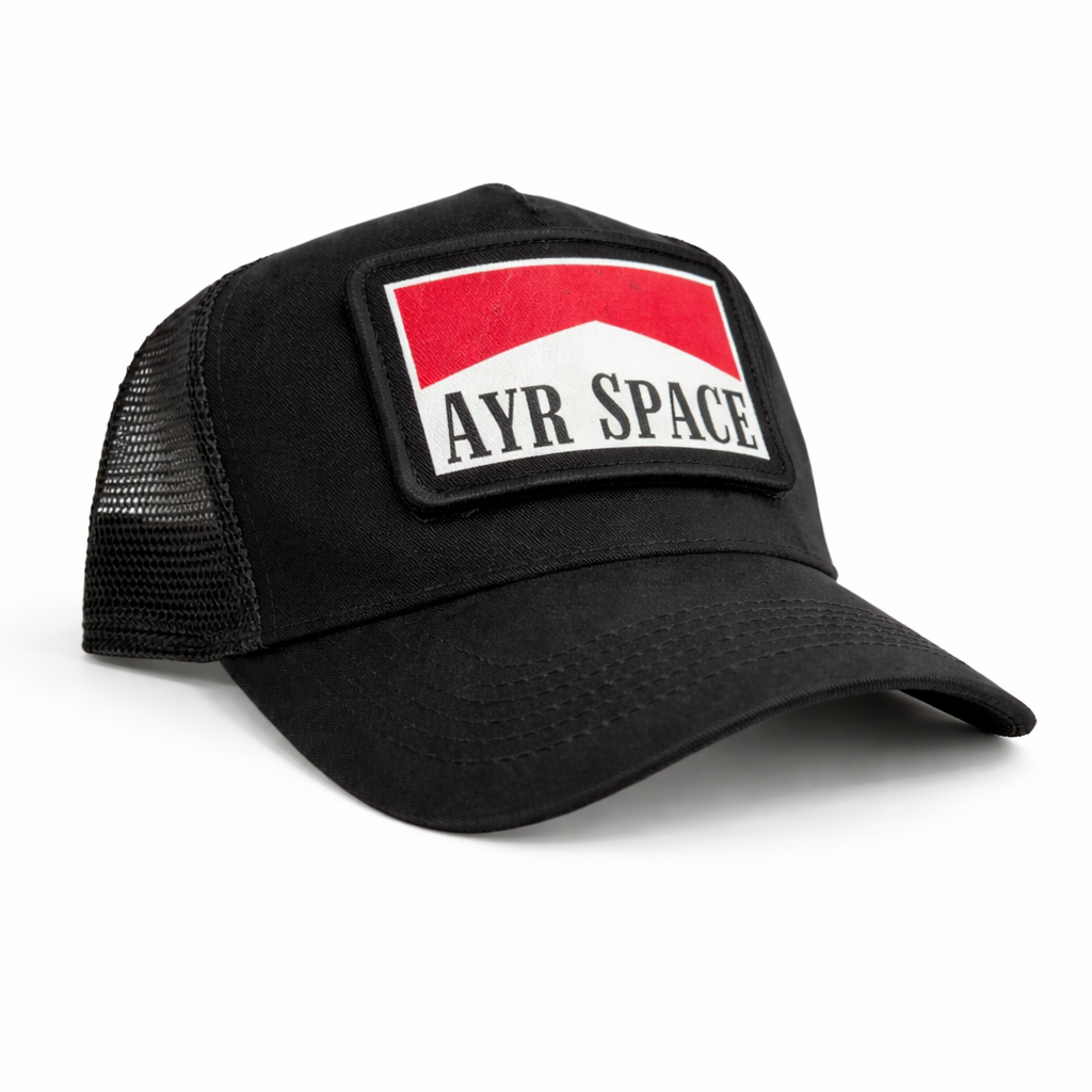 Black trucker cap with a red and white logo on a white background
