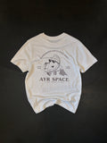 Back of the AYR SPACE Pasty T in off-white, laid flat: retro cartoon pasty in sunglasses carrying a paper bag, printed in faded brown under "Everybody's gotta have one!"
